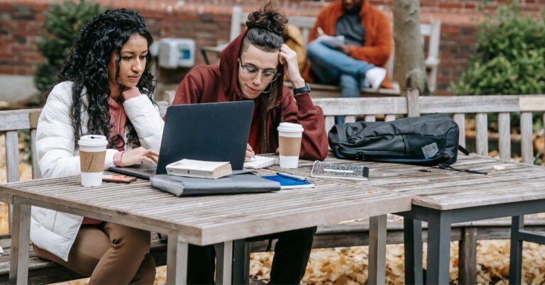 teens working on their laptop