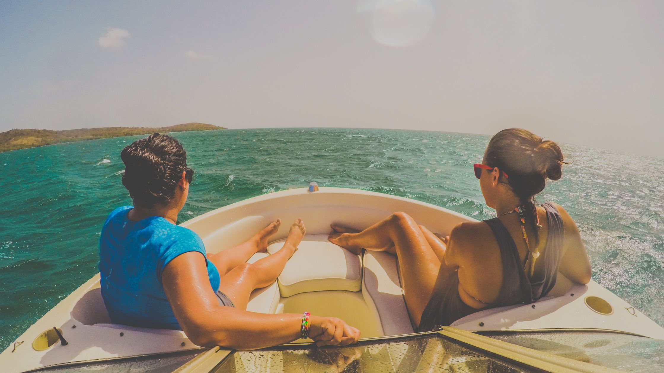 picture of two women in a boat