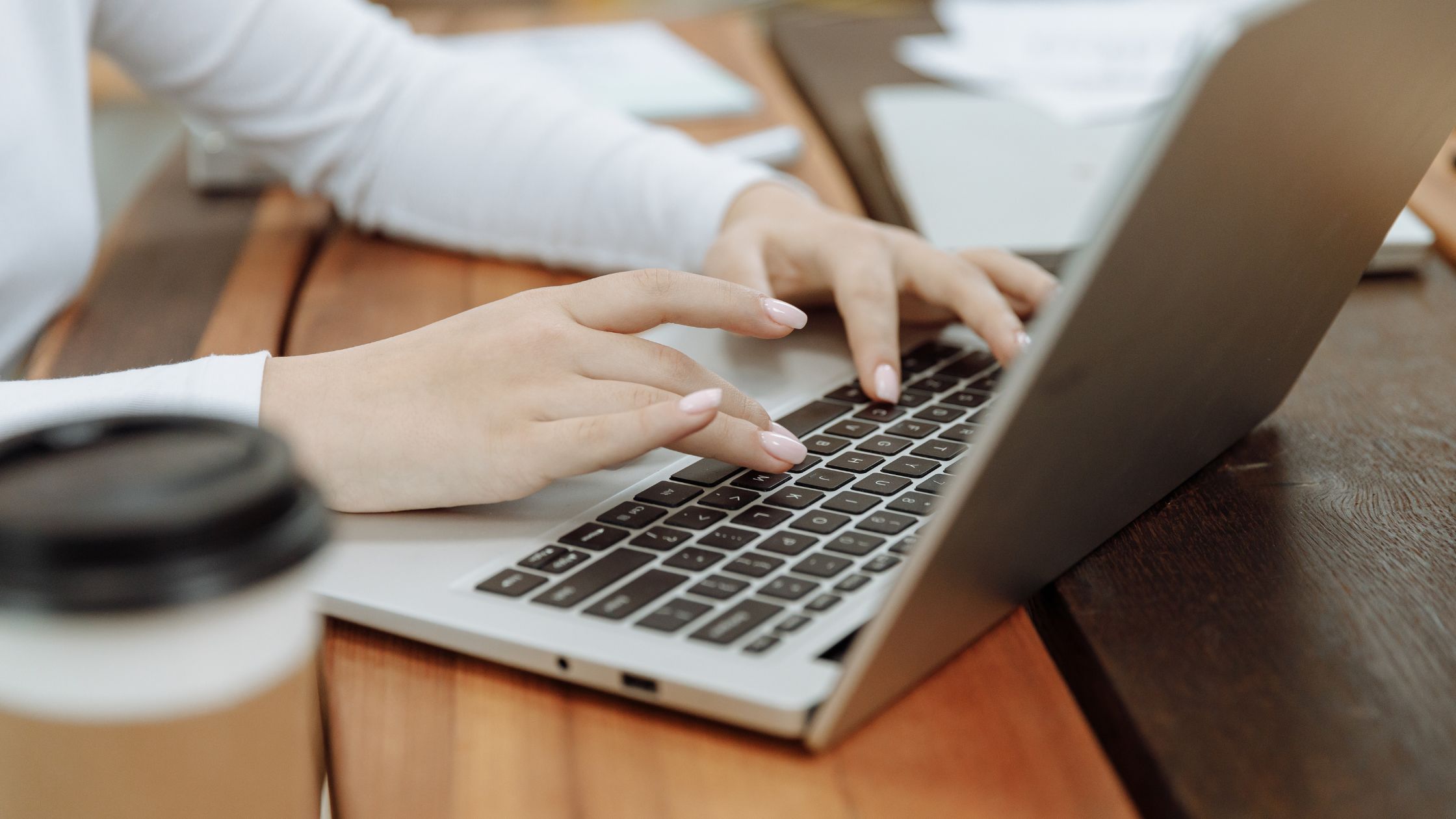 picture of some typing using a laptop