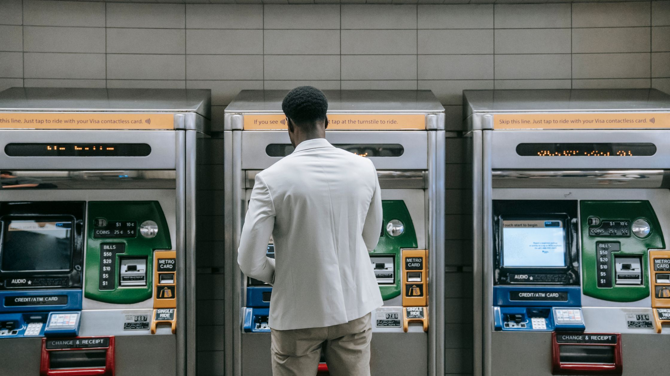 man withdrawing money at ATM