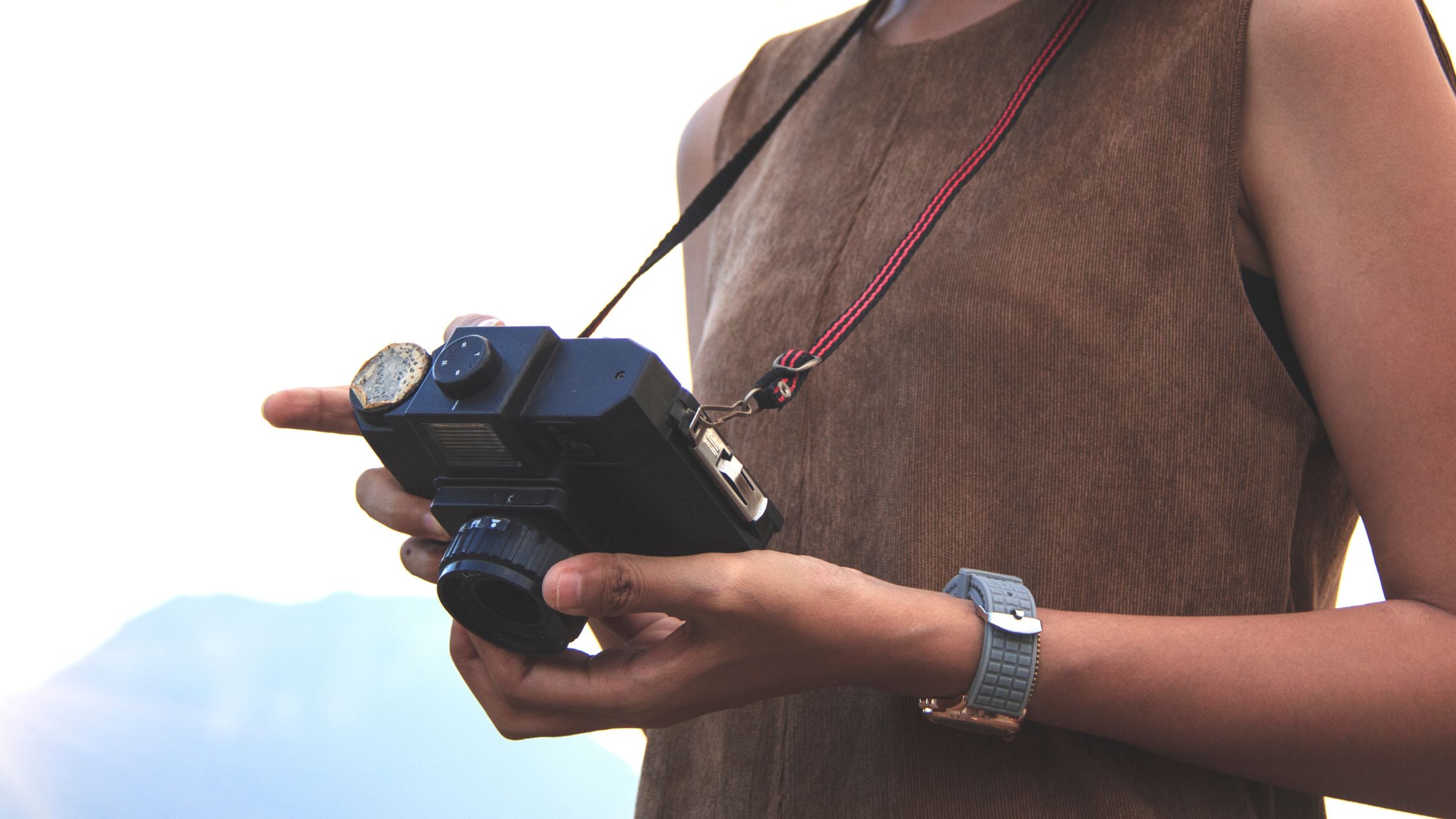 lady carrying a camera