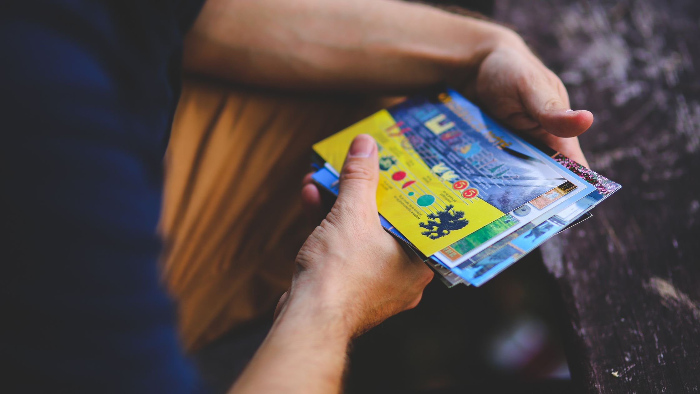 student holding tickets for sell