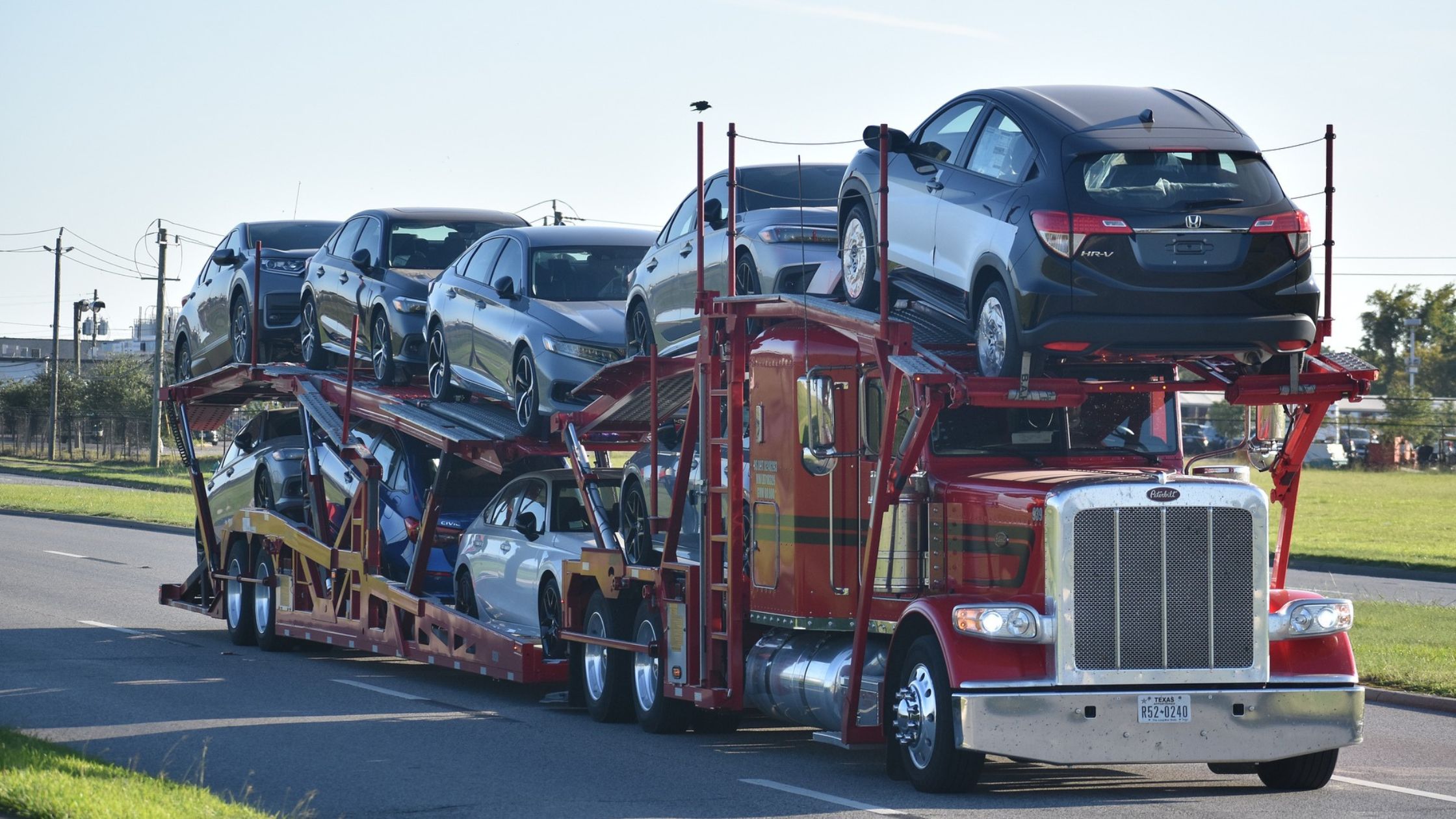 truck transporting cars - how to make money hauling cars