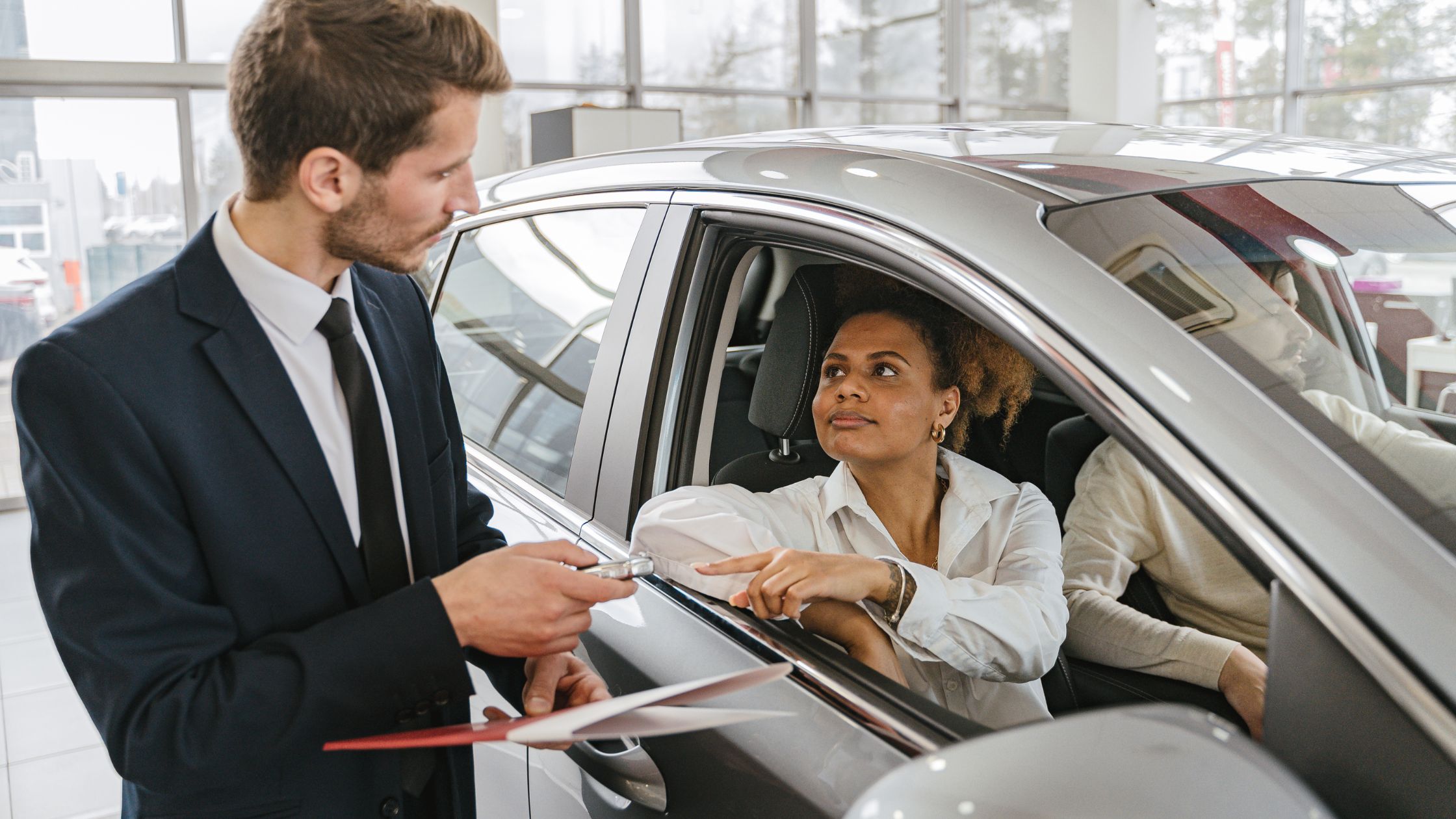 A couple receiving car keys - Things you can rent out