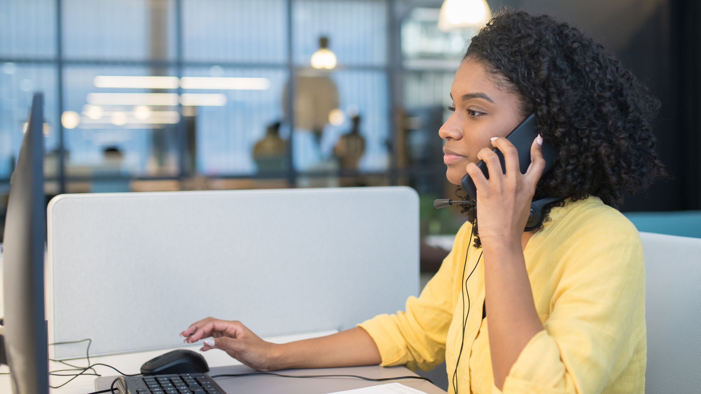 A picture of a person making calls