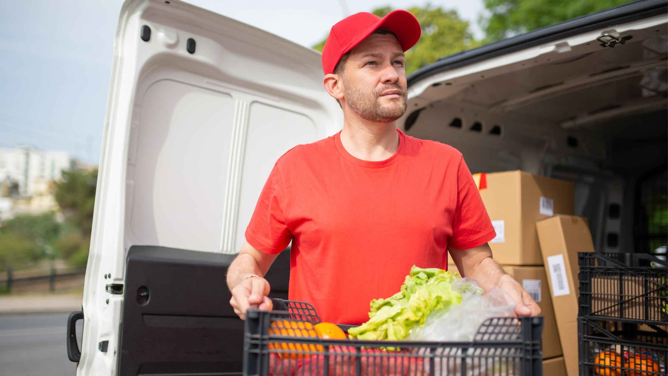 A picture of a grocery driver making deliveries