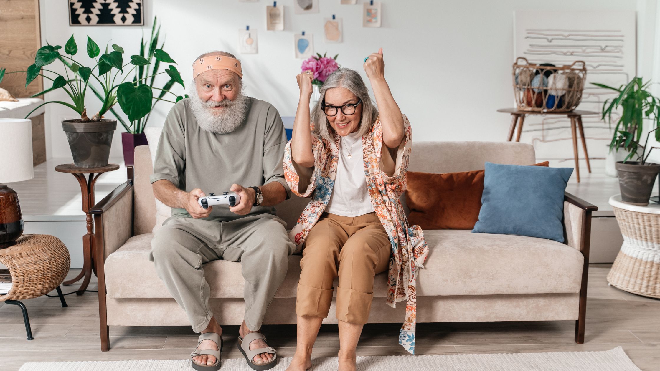 Old couple playing a video game