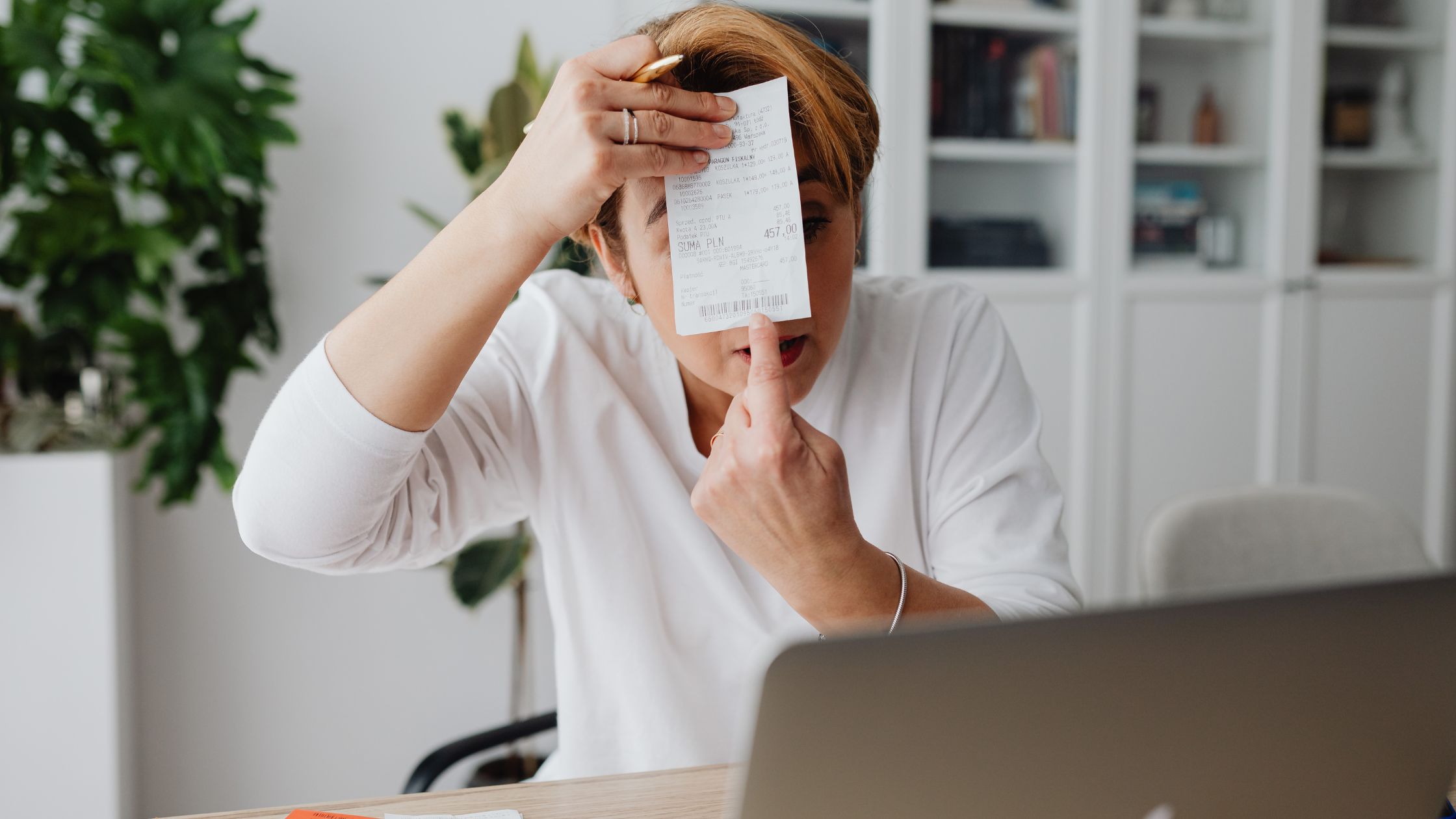 A lady showing a receipt