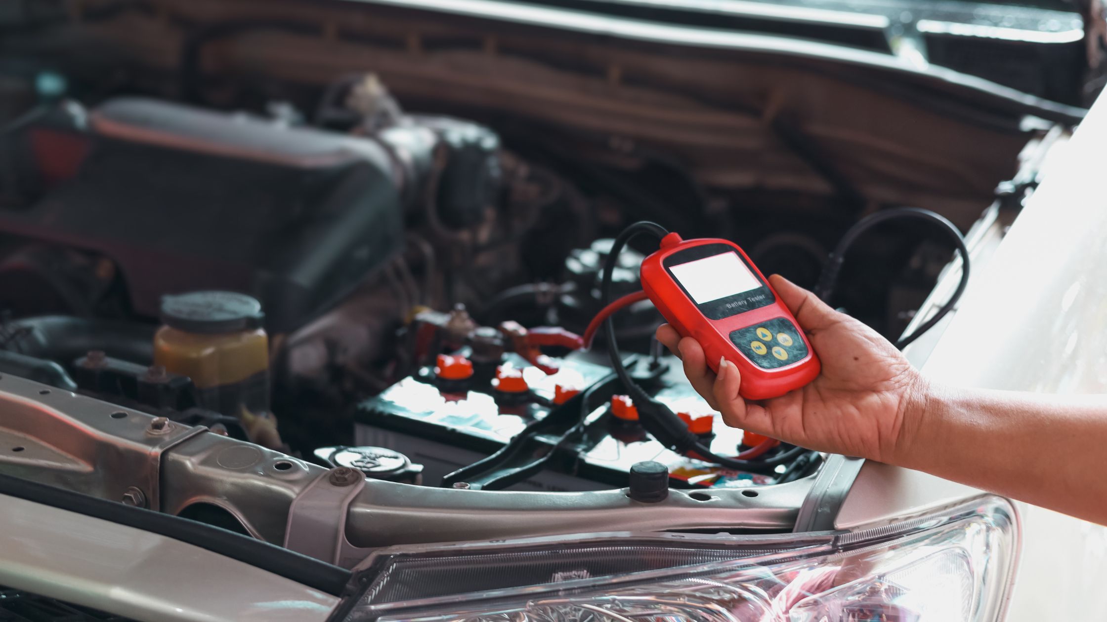 Mechanic working on a car